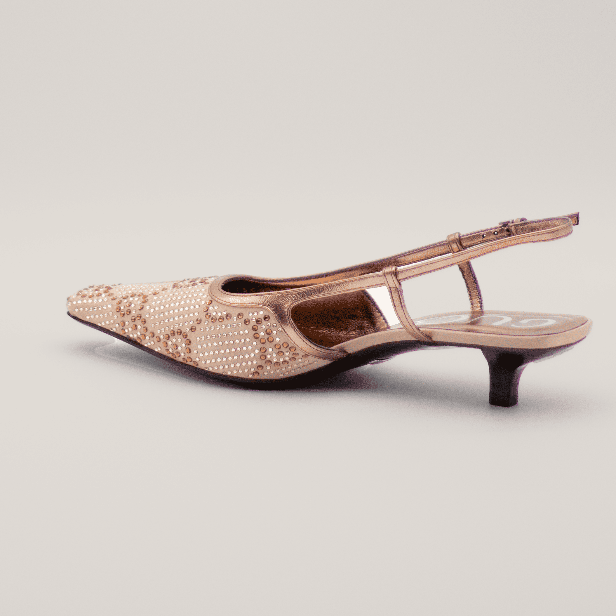 Exclusive Gucci GG Slingback Pumps